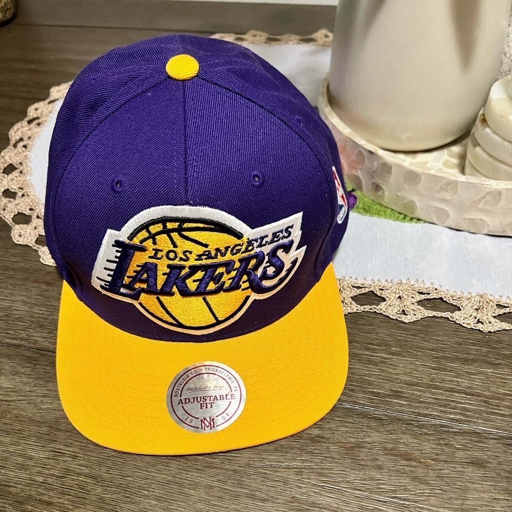 Mitchell & Ness NBA Los Angeles Lakers Team 2 Tone 2.0 Stretch Snapback Hat.
